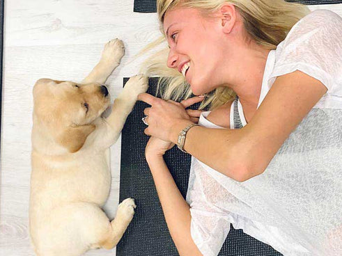 What Exactly is Dog Yoga? We Find Out!