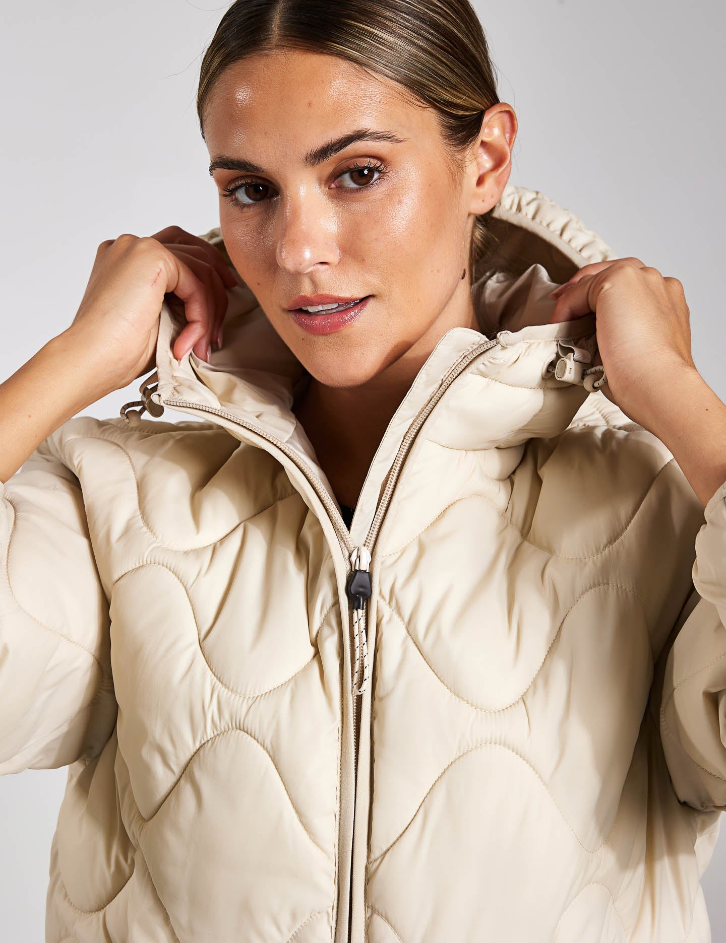 Goodmove | Stormwear™ Hooded Puffer Jacket - Beige | The Sports Edit