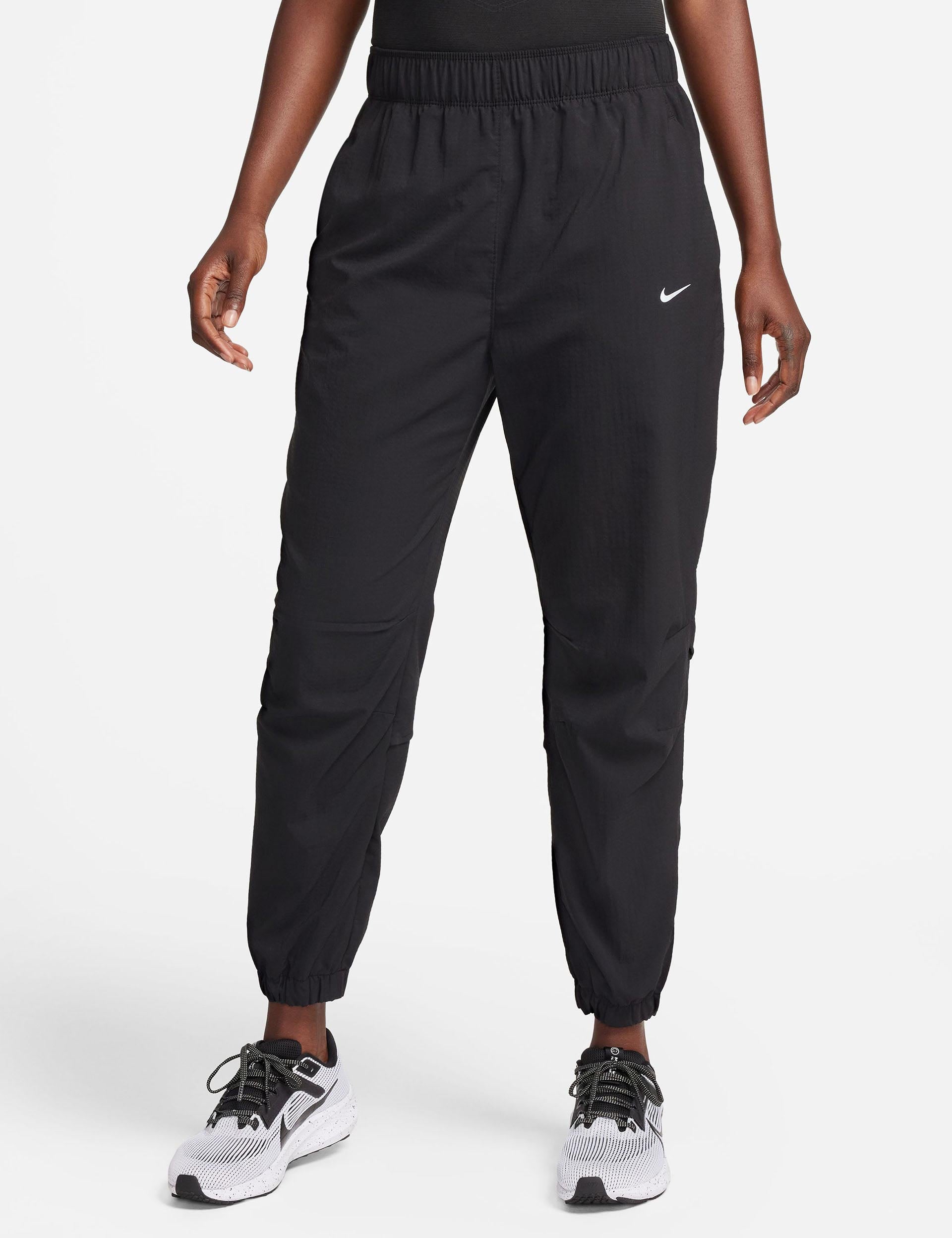 Nike Fast Women's Mid-Rise 7/8 Running Leggings with Pockets. Nike FI